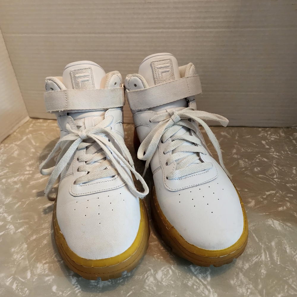 Fila Ladies White High-Top Sneakers with Yellow Gum Outsole